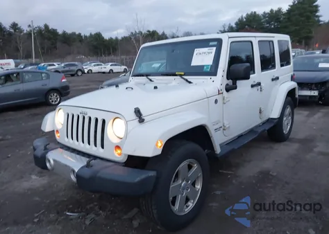 2011 Jeep Wrangler Unlimited Sahara из США, поврежденный, VIN 1J4HA5H14BL538867